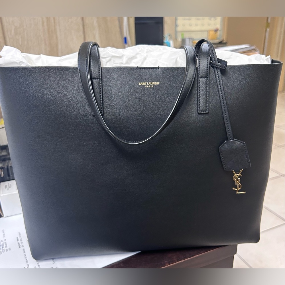 Saint Laurent Black leather shopping tote.